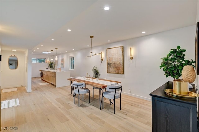 3022 El Camino Ave, Las Vegas, NV 89102 - dining space with light wood-style flooring and recessed lighting