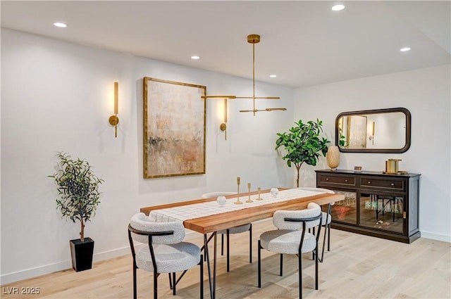 3022 El Camino Ave, Las Vegas, NV 89102 - dining room with light wood-style flooring and recessed lighting