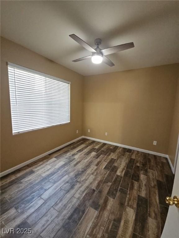 9050 W Warm Springs Rd Unit 1128, Las Vegas, NV 89148 - unfurnished room featuring dark wood finished floors and a ceiling fan