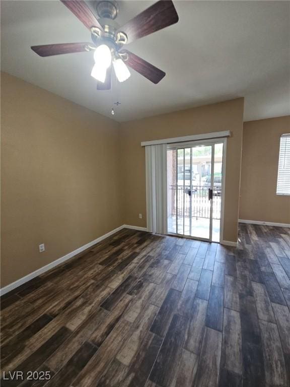 9050 W Warm Springs Rd Unit 1128, Las Vegas, NV 89148 - spare room with dark wood finished floors and a ceiling fan