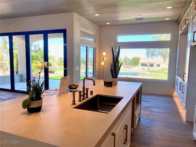 3012 Hawksdale Dr, Las Vegas, NV 89134 - kitchen with light countertops, dark wood-type flooring, french doors, recessed lighting, and wooden ceiling
