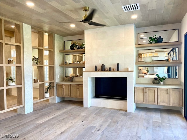 3012 Hawksdale Dr, Las Vegas, NV 89134 - living area featuring wooden ceiling, light wood finished floors, a fireplace, a ceiling fan, and recessed lighting