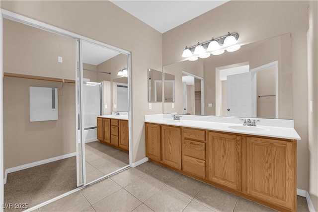 9489 Country Highlands Ct, Las Vegas, NV 89178 - bathroom with double vanity and tile patterned flooring