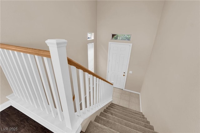 9489 Country Highlands Ct, Las Vegas, NV 89178 - stairway with baseboards and tile patterned floors