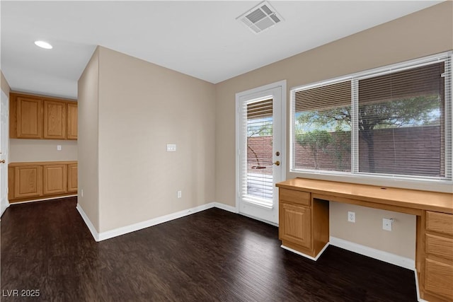 9489 Country Highlands Ct, Las Vegas, NV 89178 - unfurnished office featuring dark wood finished floors, built in desk, and recessed lighting