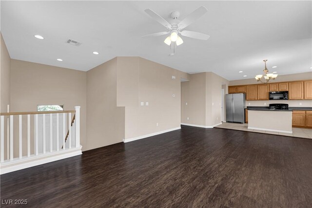 9489 Country Highlands Ct, Las Vegas, NV 89178 - unfurnished living room with a chandelier, wood finished floors, recessed lighting, and ceiling fan