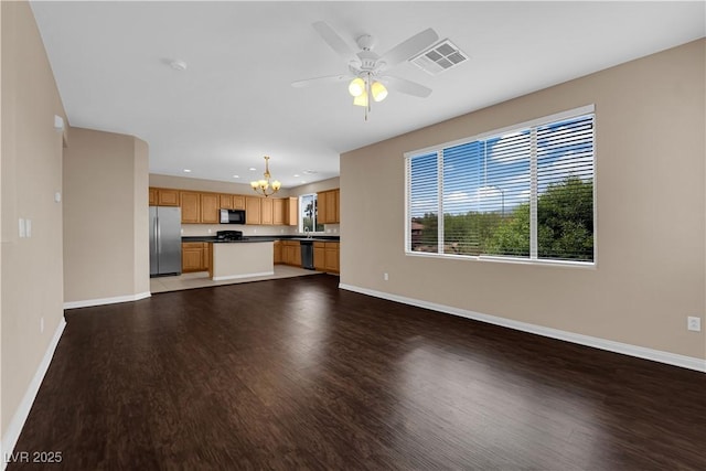 9489 Country Highlands Ct, Las Vegas, NV 89178 - unfurnished living room featuring a chandelier, dark wood finished floors, ceiling fan, and recessed lighting