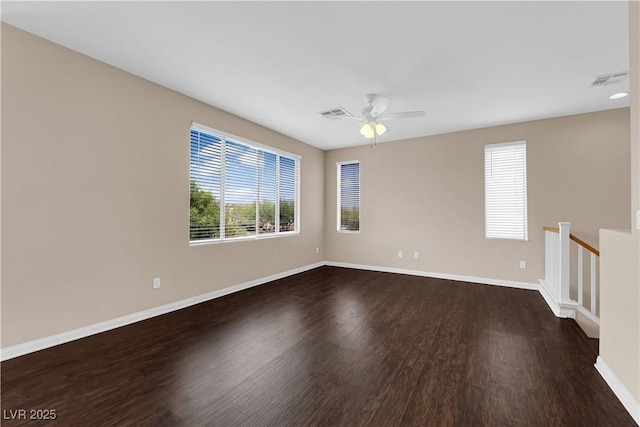 9489 Country Highlands Ct, Las Vegas, NV 89178 - unfurnished room featuring dark wood-style floors and ceiling fan