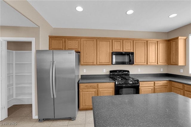 9489 Country Highlands Ct, Las Vegas, NV 89178 - kitchen featuring black appliances, dark countertops, light tile patterned floors, and recessed lighting