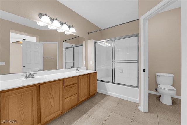 9489 Country Highlands Ct, Las Vegas, NV 89178 - full bathroom featuring double vanity, tile patterned flooring, and combined bath / shower with glass door