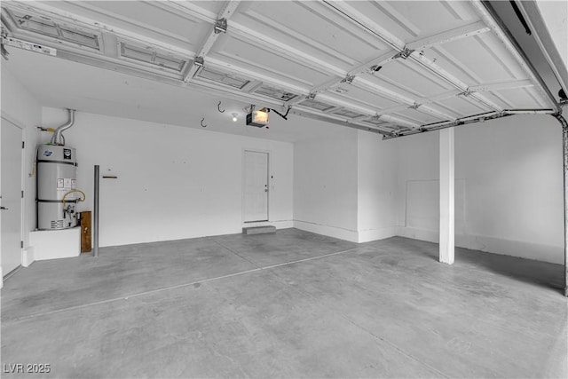 9489 Country Highlands Ct, Las Vegas, NV 89178 - garage with a garage door opener and water heater