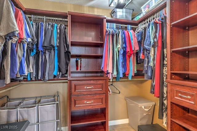 4006 Clove Tree Ct, North Las Vegas, NV 89031 - spacious closet with tile patterned flooring