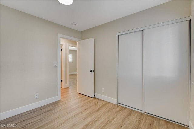 4512 Mark Ave, Las Vegas, NV 89108 - unfurnished bedroom with wood finished floors and a closet