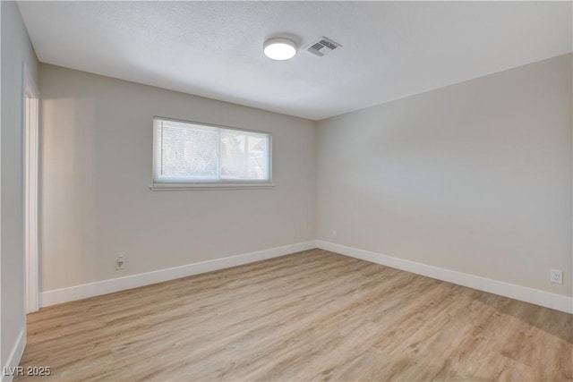 4512 Mark Ave, Las Vegas, NV 89108 - unfurnished room featuring light wood finished floors and baseboards