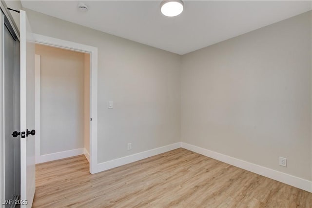 4512 Mark Ave, Las Vegas, NV 89108 - spare room with light wood-style flooring and a smoke detector