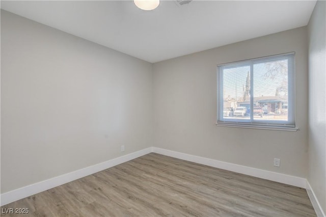 4512 Mark Ave, Las Vegas, NV 89108 - empty room with light wood-style flooring