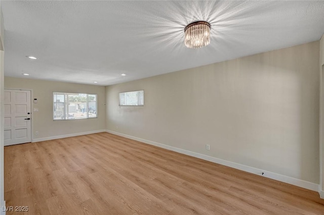 4804 Apawana Ln, Las Vegas, NV 89108 - empty room featuring light wood finished floors and recessed lighting