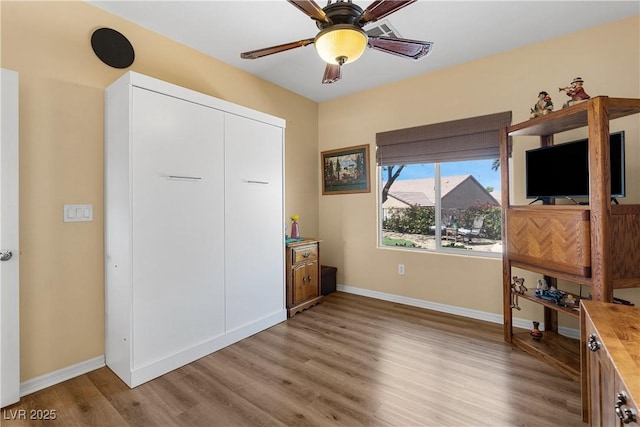 2606 Crested Butte St, Henderson, NV 89052 - unfurnished bedroom featuring light wood finished floors and ceiling fan