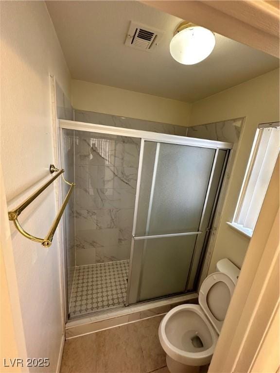 1332 Wheatland Way, Las Vegas, NV 89128 - bathroom with a stall shower and tile patterned floors
