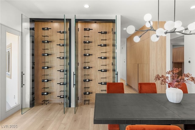 8617 Titleist Cir, Las Vegas, NV 89117 - wine room with light wood finished floors