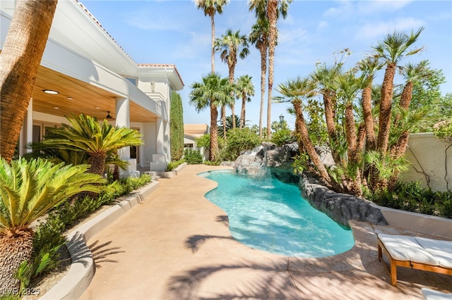 8617 Titleist Cir, Las Vegas, NV 89117 - swimming pool featuring a ceiling fan and a patio area