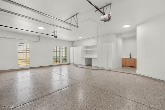8617 Titleist Cir, Las Vegas, NV 89117 - garage with a garage door opener and recessed lighting