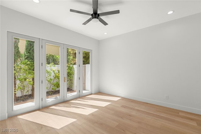 8617 Titleist Cir, Las Vegas, NV 89117 - spare room with french doors, light wood-style flooring, recessed lighting, and a ceiling fan