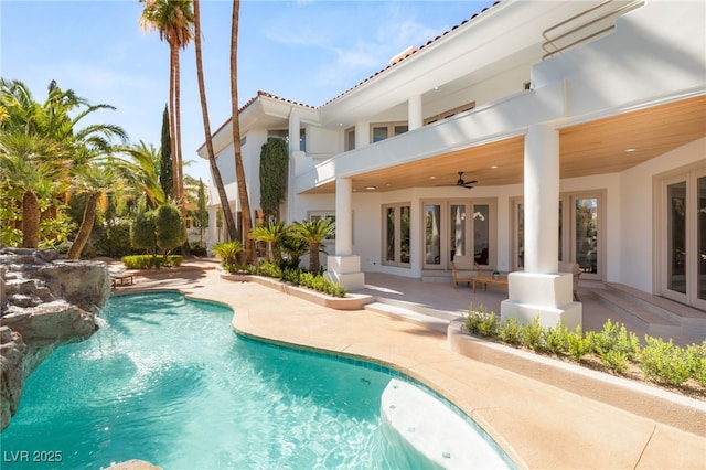 8617 Titleist Cir, Las Vegas, NV 89117 - swimming pool with french doors, a patio area, and ceiling fan