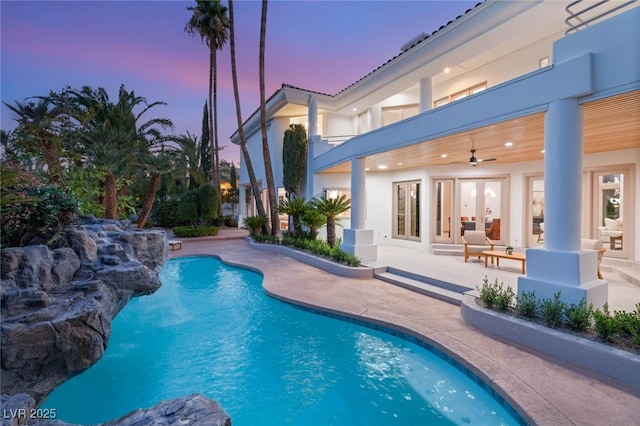 8617 Titleist Cir, Las Vegas, NV 89117 - outdoor pool featuring a patio, ceiling fan, and french doors