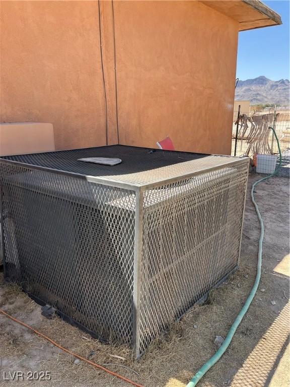 2170 W Gally Rd, Pahrump, NV 89060 - exterior view of stucco siding and mountains