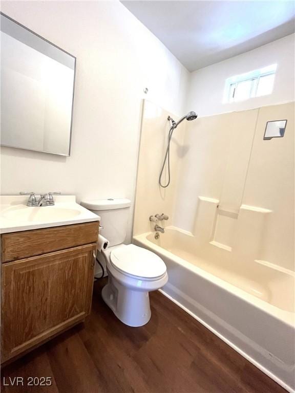 2170 W Gally Rd, Pahrump, NV 89060 - bathroom featuring wood finished floors, vanity, and shower / tub combination