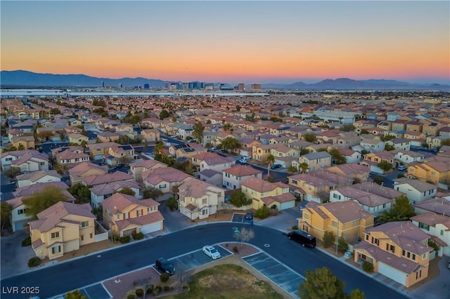 6005 Bristol Crest Ln, Las Vegas, NV 89139 - aerial view at dusk of a mountain view and a residential view