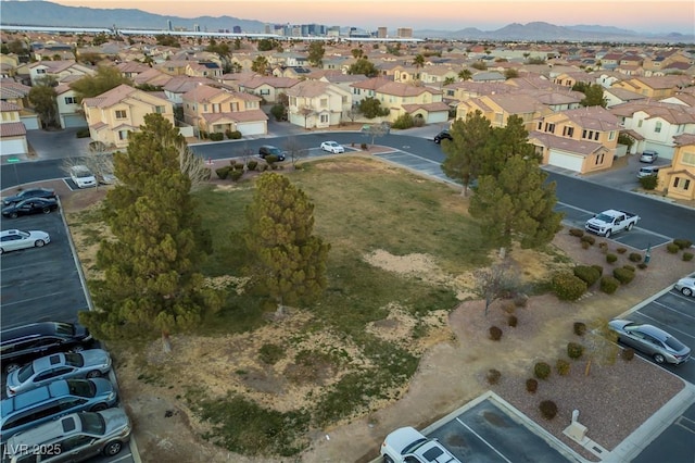 6005 Bristol Crest Ln, Las Vegas, NV 89139 - aerial view at dusk of a residential view and a mountain view