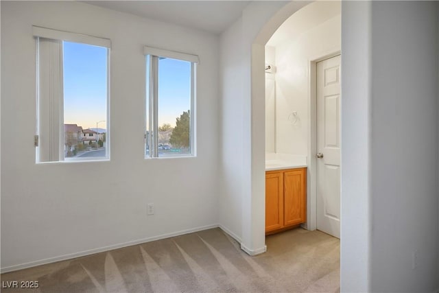 6005 Bristol Crest Ln, Las Vegas, NV 89139 - unfurnished bedroom with light colored carpet and arched walkways