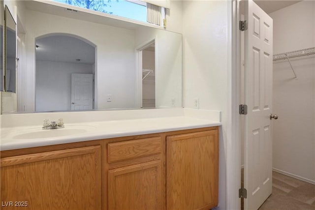 6005 Bristol Crest Ln, Las Vegas, NV 89139 - bathroom with vanity and a spacious closet