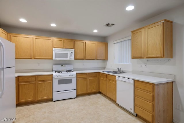 6005 Bristol Crest Ln, Las Vegas, NV 89139 - kitchen with white appliances, recessed lighting, and light countertops