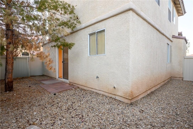6005 Bristol Crest Ln, Las Vegas, NV 89139 - view of side of property featuring stucco siding