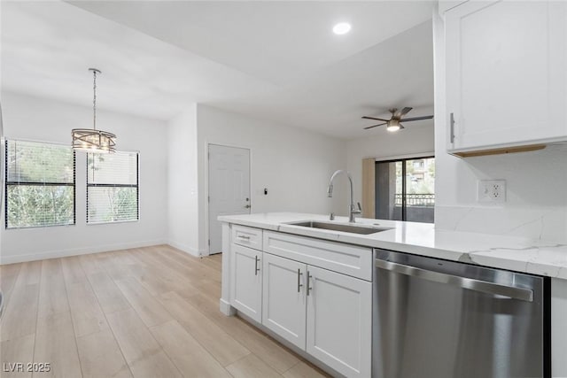 8250 N Grand Canyon Dr Unit 1050, Las Vegas, NV 89166 - kitchen featuring dishwasher, a chandelier, white cabinets, a ceiling fan, and hanging light fixtures