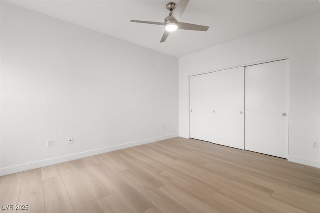 8250 N Grand Canyon Dr Unit 1050, Las Vegas, NV 89166 - unfurnished bedroom with light wood finished floors, a closet, and a ceiling fan