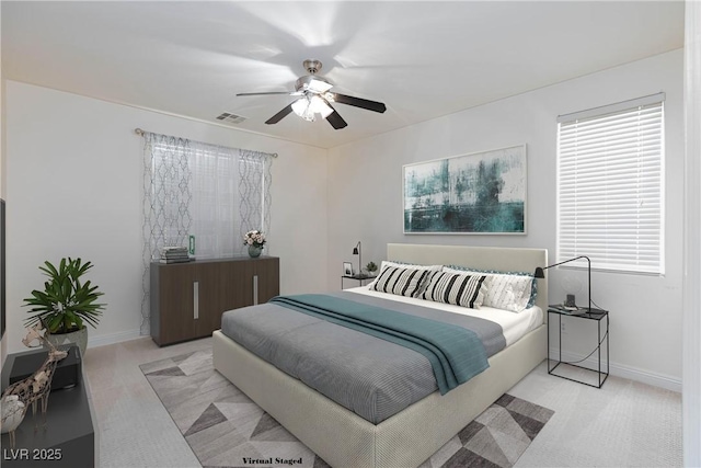 7112 Rancho De Taos Ct, Las Vegas, NV 89130 - bedroom with light colored carpet and a ceiling fan