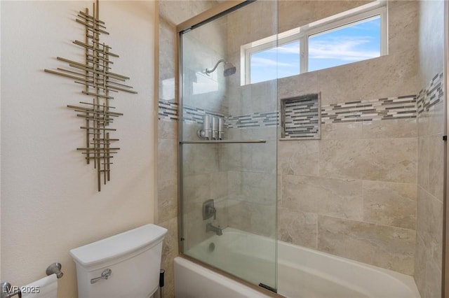 7112 Rancho De Taos Ct, Las Vegas, NV 89130 - bathroom featuring toilet and shower / bath combination with glass door