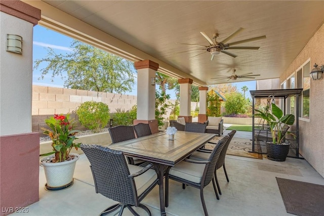 7112 Rancho De Taos Ct, Las Vegas, NV 89130 - view of patio / terrace featuring a ceiling fan and outdoor dining space