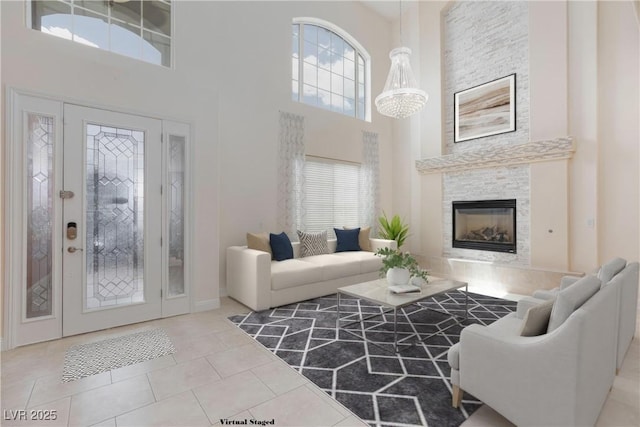 7112 Rancho De Taos Ct, Las Vegas, NV 89130 - living area featuring a high ceiling, a tiled fireplace, and tile patterned flooring