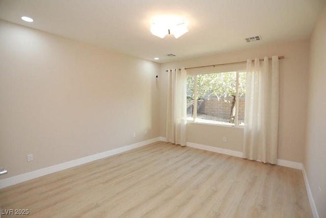 2623 Red Planet St, Henderson, NV 89044 - empty room featuring wood finished floors and recessed lighting