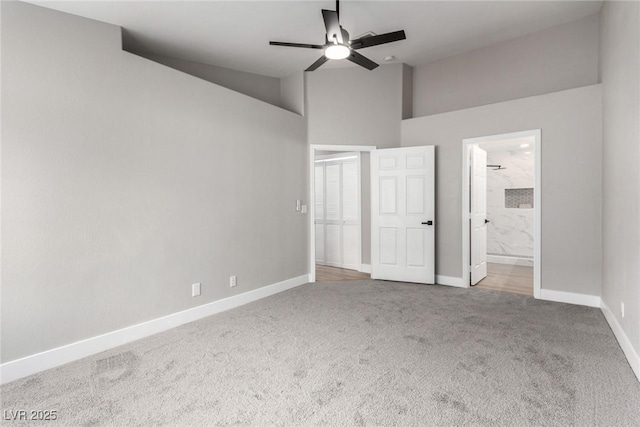 3408 Winterhaven St Unit 203, Las Vegas, NV 89108 - unfurnished bedroom with carpet flooring, high vaulted ceiling, ensuite bathroom, and ceiling fan