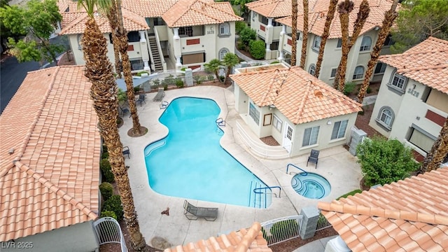 3408 Winterhaven St Unit 203, Las Vegas, NV 89108 - community pool with a patio, a residential view, and a gate