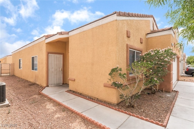 1635 Otto Merida Ave, Las Vegas, NV 89106 - property entrance featuring stucco siding and concrete driveway