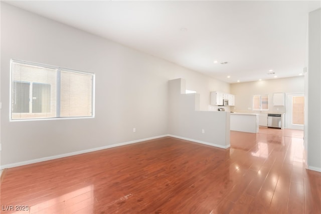 1635 Otto Merida Ave, Las Vegas, NV 89106 - unfurnished living room featuring light wood-style floors and recessed lighting