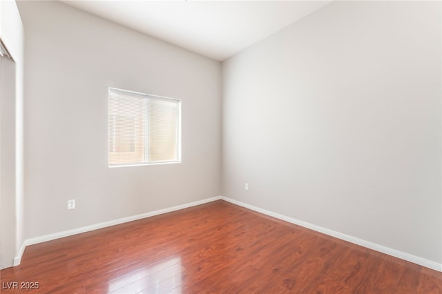 1635 Otto Merida Ave, Las Vegas, NV 89106 - spare room featuring wood finished floors and baseboards