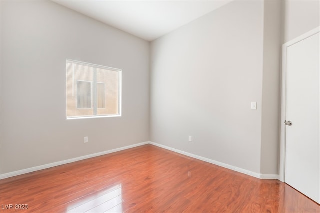1635 Otto Merida Ave, Las Vegas, NV 89106 - spare room featuring wood finished floors and baseboards